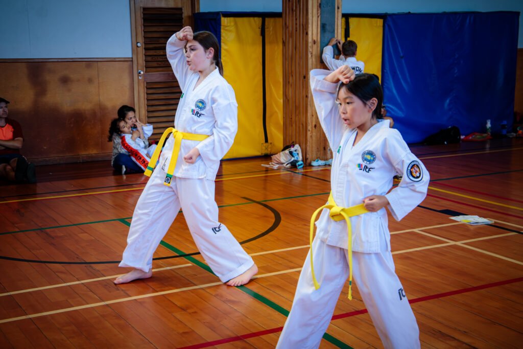 children building strong goal-setting habits during Taekwon-Do training on the floor